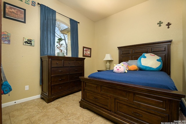 bedroom with baseboards