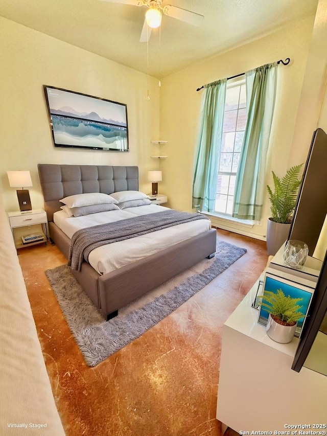 bedroom featuring ceiling fan