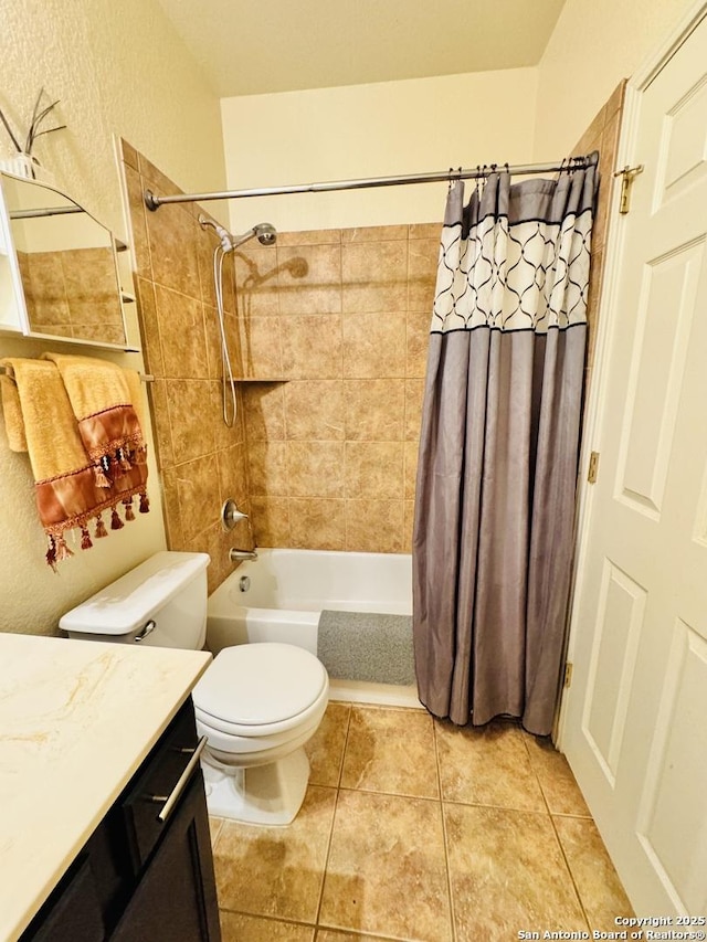 bathroom with toilet, tile patterned floors, shower / bath combo, and vanity