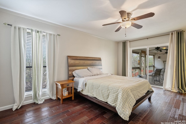 bedroom with baseboards, dark wood finished floors, a ceiling fan, and access to exterior