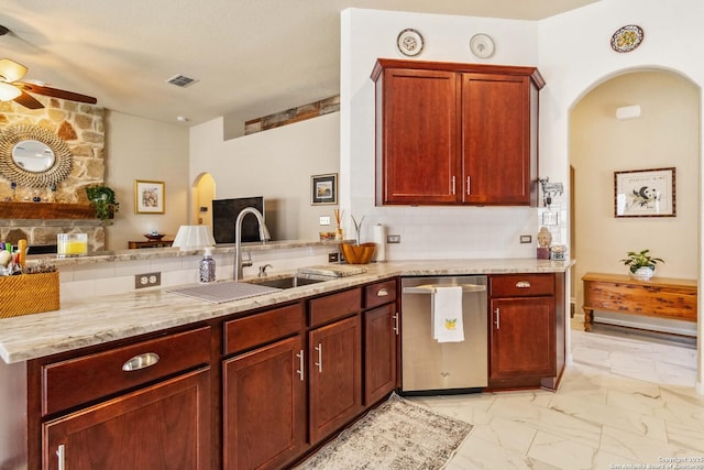 kitchen featuring a sink, visible vents, marble finish floor, stainless steel dishwasher, and light stone countertops