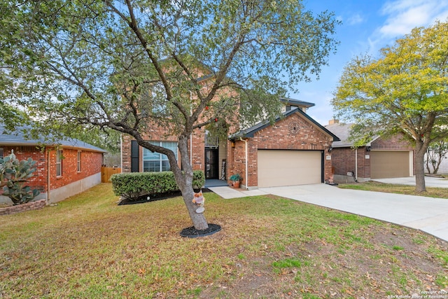 view of front of house with an attached garage, driveway, a front lawn, and brick siding