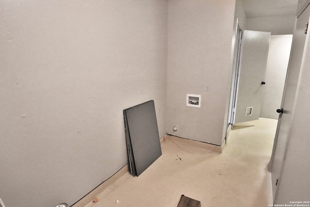 washroom with hookup for a washing machine and laundry area