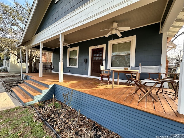 deck featuring a porch and ceiling fan