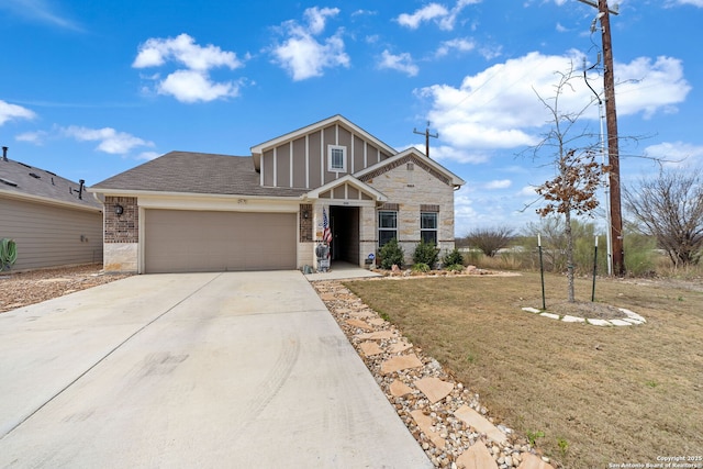 view of front of home with roof with shingles, a front yard, a garage, stone siding, and driveway