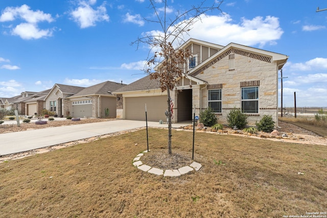 view of front of property featuring an attached garage, stone siding, a front lawn, and concrete driveway