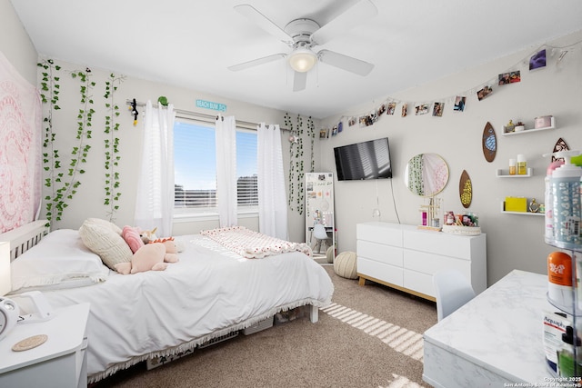 bedroom featuring carpet floors and a ceiling fan