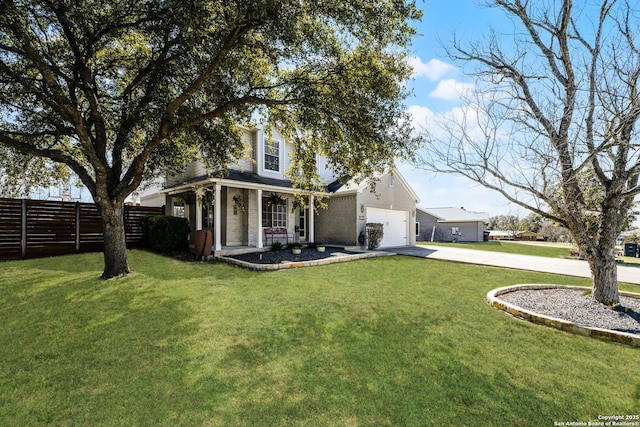 view of front facade featuring concrete driveway, an attached garage, fence, and a front yard