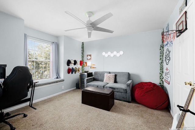 interior space with ceiling fan and baseboards