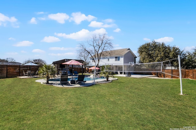 view of yard featuring a gazebo, a patio area, volleyball court, and fence