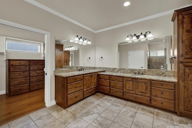 948 Hudson, New Braunfels, TX 78130 - bathroom with double vanity, ornamental molding, tiled shower, and a sink