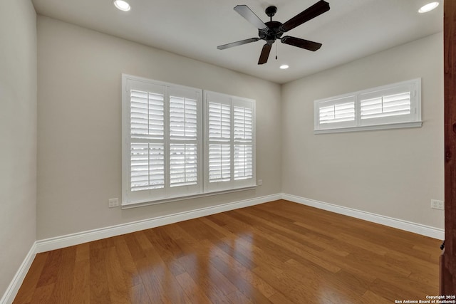 948 Hudson, New Braunfels, TX 78130 - spare room featuring plenty of natural light, baseboards, wood finished floors, and recessed lighting