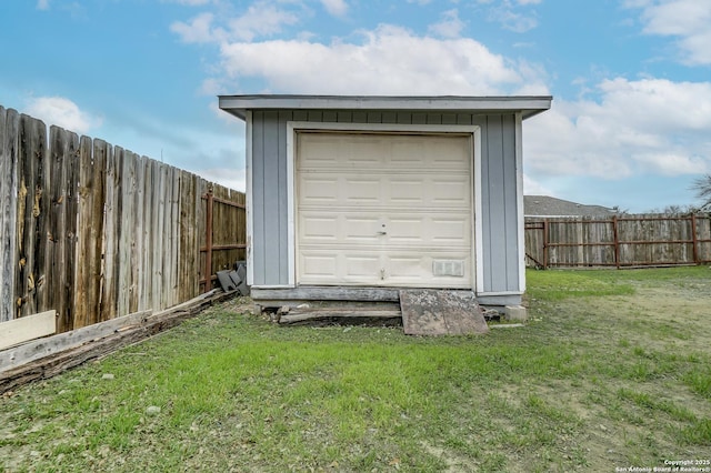 garage with fence