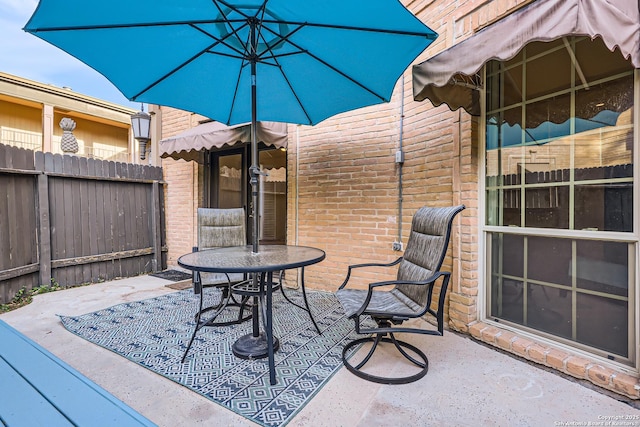 view of patio / terrace with fence