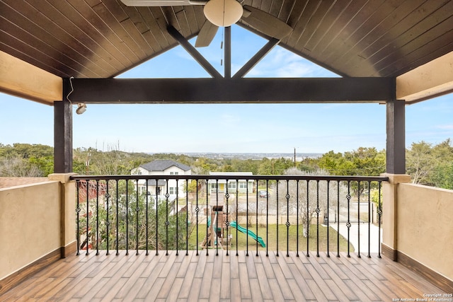 wooden deck featuring a ceiling fan