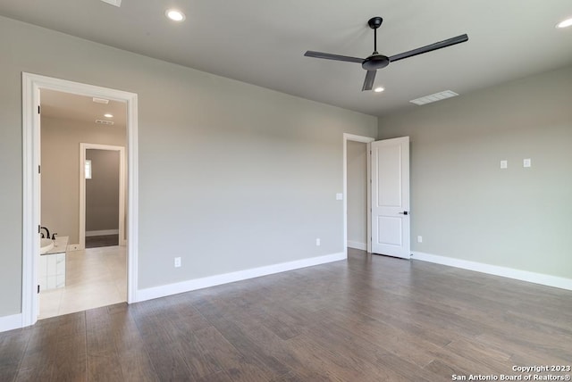 unfurnished room with baseboards, visible vents, ceiling fan, dark wood-style flooring, and recessed lighting