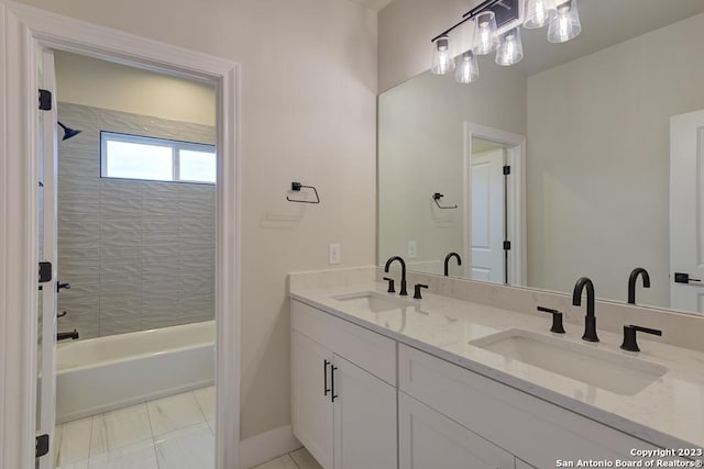 full bath featuring double vanity, shower / bath combination, and a sink