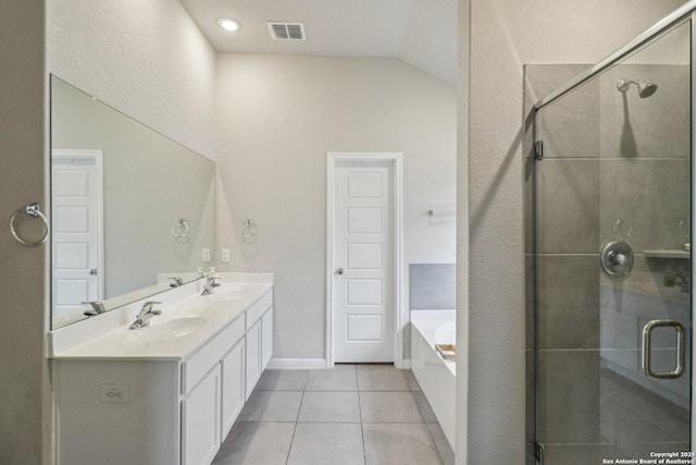 full bath with tile patterned flooring, visible vents, a sink, and a shower stall