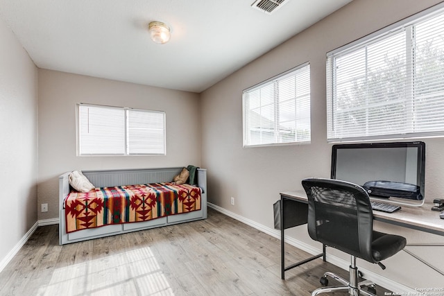 215 Quince Flower, San Antonio, TX 78253 - bedroom featuring baseboards, visible vents, and wood finished floors