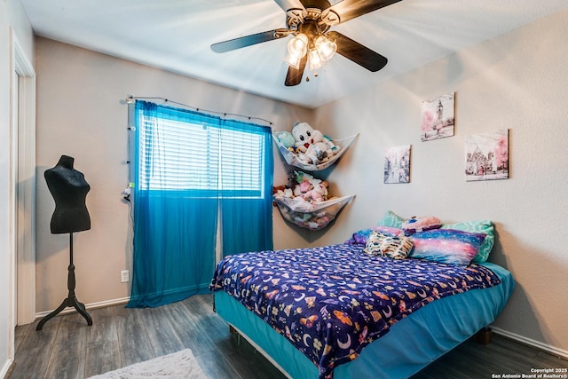 215 Quince Flower, San Antonio, TX 78253 - bedroom with a ceiling fan, baseboards, and wood finished floors