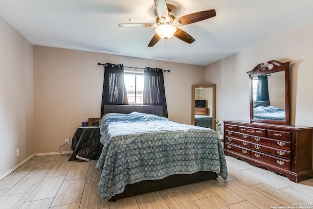 215 Quince Flower, San Antonio, TX 78253 - bedroom featuring ceiling fan, wood tiled floor, and baseboards