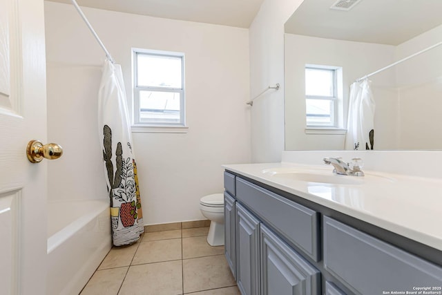 bathroom with toilet, visible vents, vanity, tile patterned floors, and shower / bath combo