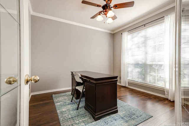 office featuring dark wood finished floors, crown molding, baseboards, and ceiling fan