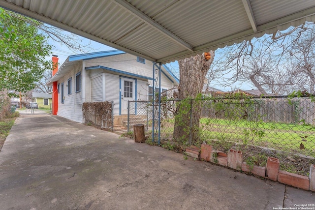 view of patio featuring fence