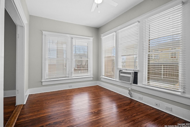 interior space featuring a ceiling fan and cooling unit