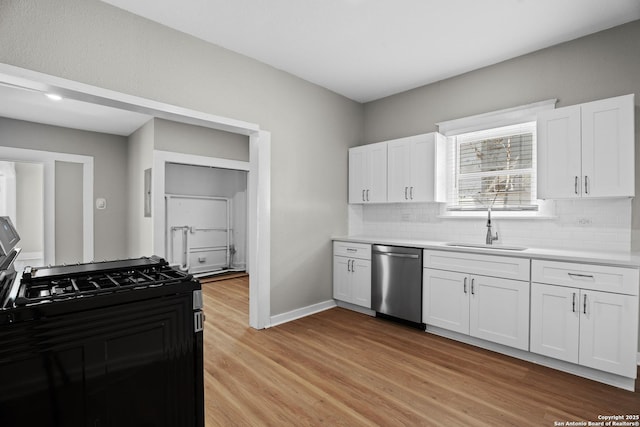 kitchen with light wood-style floors, white cabinetry, black gas stove, a sink, and dishwasher