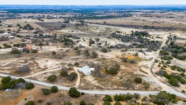 aerial view with a desert view and a rural view