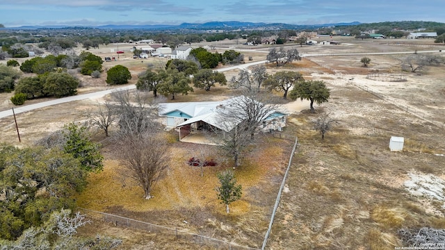 aerial view featuring a rural view and a mountain view