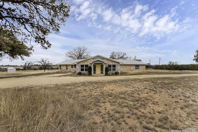 view of front facade with stone siding