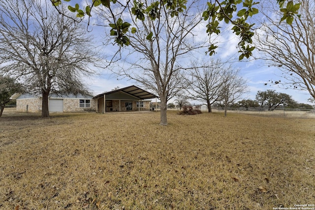 view of yard featuring fence