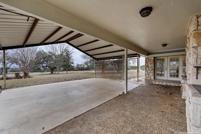 view of patio with a carport and french doors