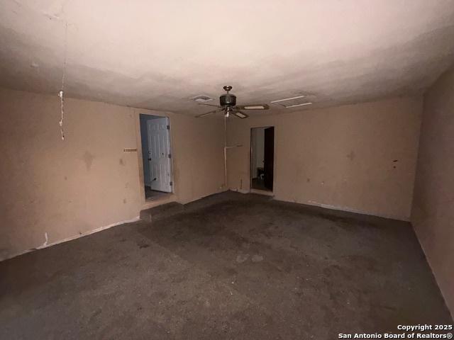 spare room featuring concrete flooring