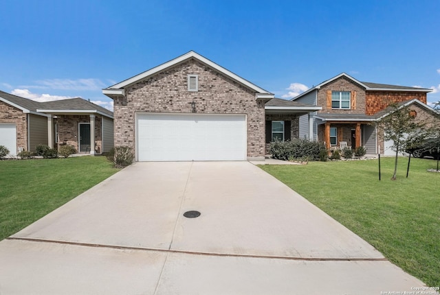 view of front of home with a garage, a front yard, concrete driveway, and brick siding