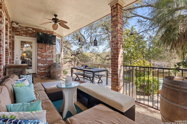 view of patio / terrace with outdoor lounge area, ceiling fan, and outdoor dining area