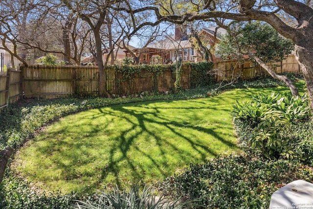 view of yard featuring fence private yard