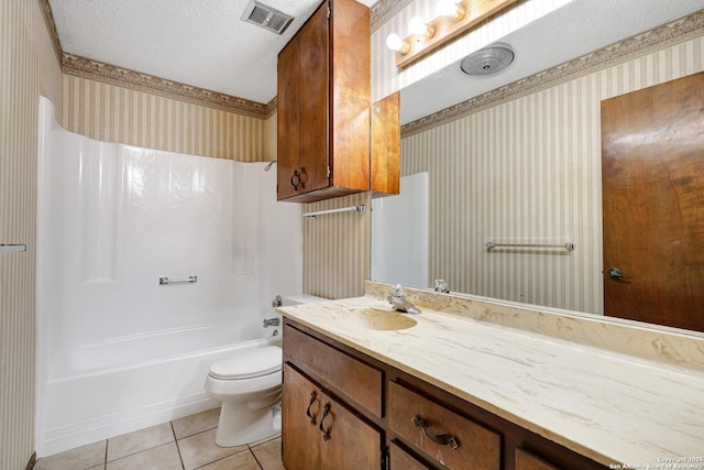 bathroom with a textured ceiling, toilet, visible vents, and wallpapered walls