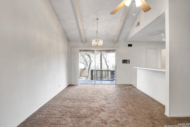 empty room featuring a textured ceiling, beam ceiling, visible vents, and carpet flooring