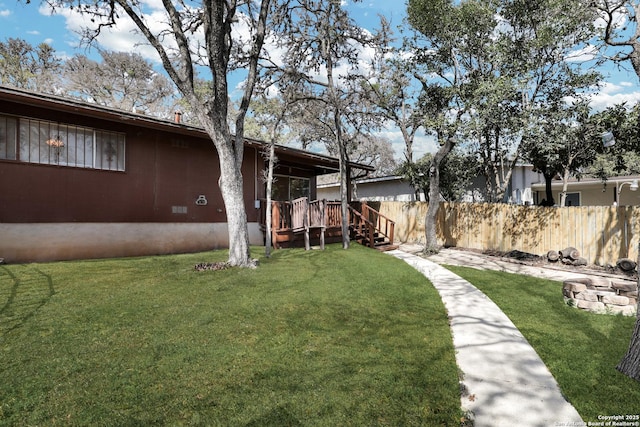 view of yard featuring fence