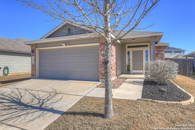 single story home with an attached garage, driveway, fence, and brick siding