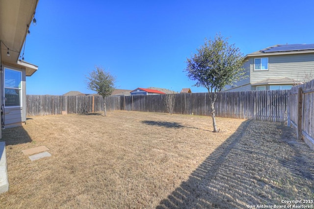 view of yard featuring a fenced backyard