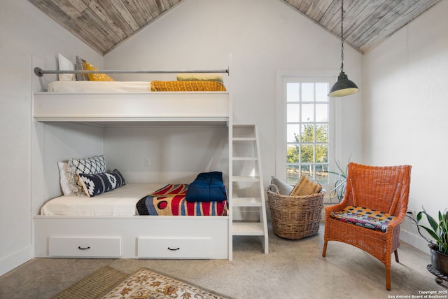 bedroom with lofted ceiling and wooden ceiling