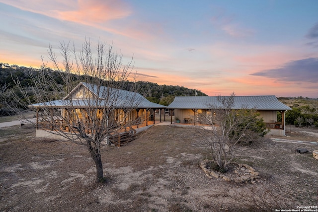 view of front of house with metal roof