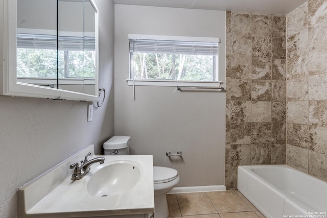 full bath featuring vanity, tile patterned flooring, toilet, and baseboards