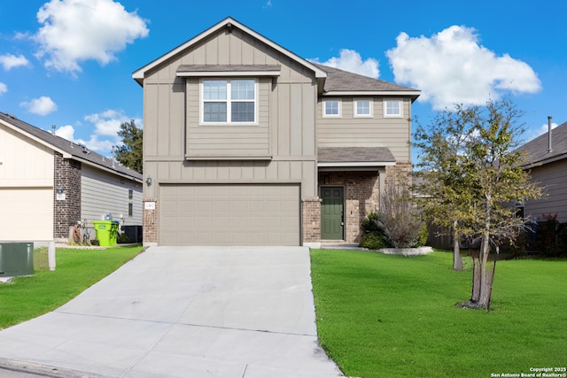 craftsman house with brick siding, board and batten siding, a front yard, a garage, and driveway