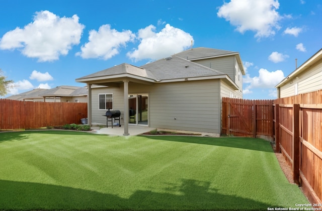 back of property featuring a patio area and a fenced backyard