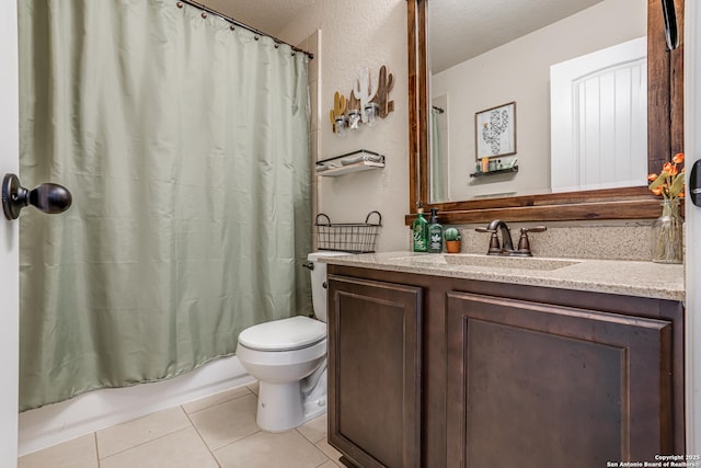 bathroom featuring vanity, shower / tub combo, tile patterned flooring, and toilet